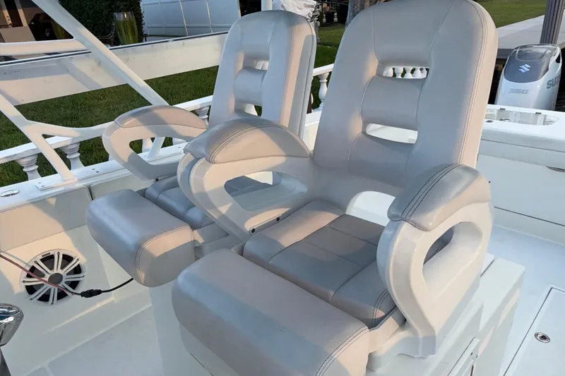 Slide: The Image of Luxury seating on 2021 Marlin 39 CC boat, featuring ergonomic design and premium materials. - 48