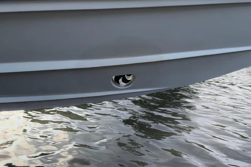 Slide: The Image of 2021 Marlin 39 CC boat hull detail above water. - 71