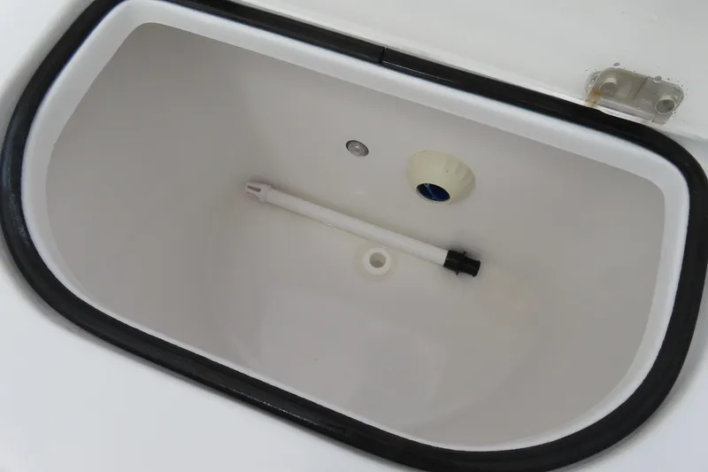 Slide: The Image of 2024 Sea Hunt Gamefish 30 Coffin Box interior, featuring a clean, white compartment. - 13