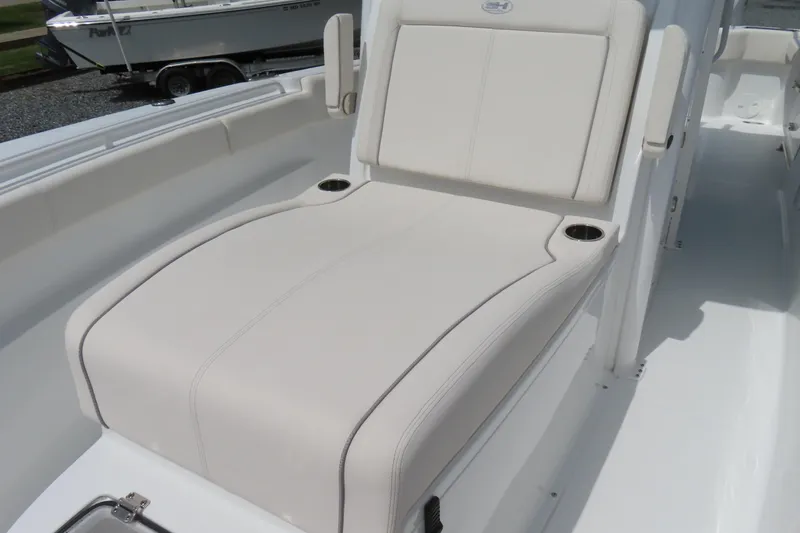 Slide: The Image of 2024 Sea Hunt Gamefish 30 Coffin Box, featuring a comfortable white seating area. - 14