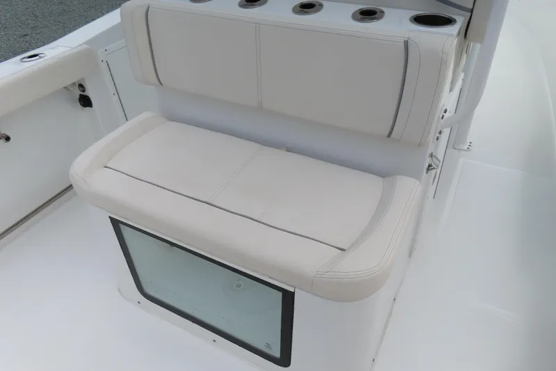 Slide: The Image of 2024 Sea Hunt Gamefish 30 Coffin Box boat seating with integrated storage. - 25
