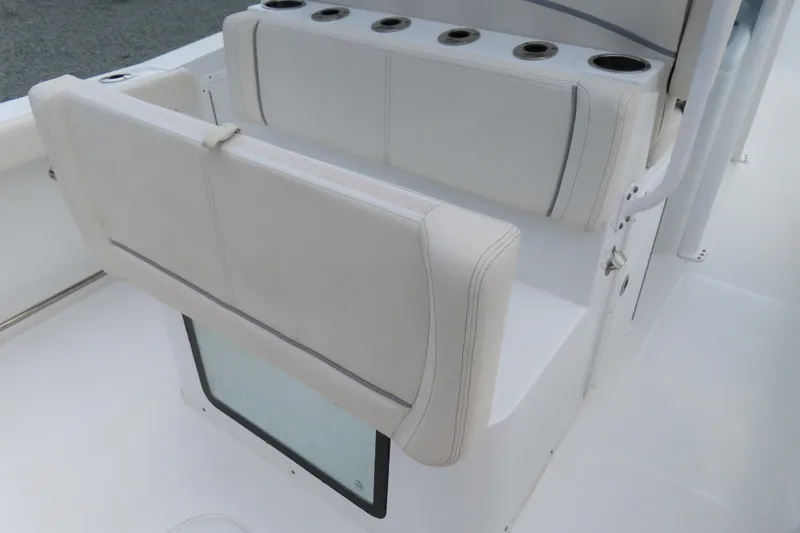 Slide: The Image of 2024 Sea Hunt Gamefish 30 Coffin Box boat seating with cup holders. - 26