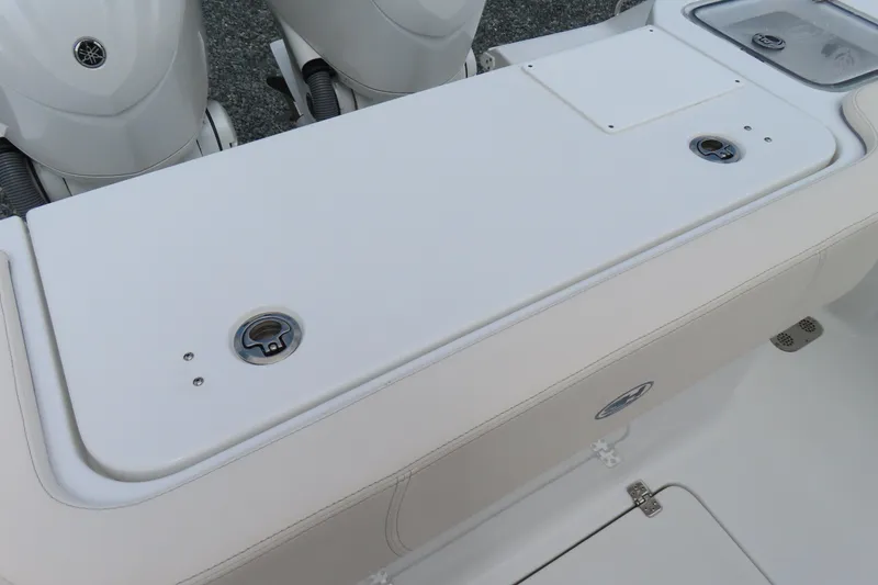 Slide: The Image of 2024 Sea Hunt Gamefish 30 Coffin Box with dual engines and storage compartments. - 30