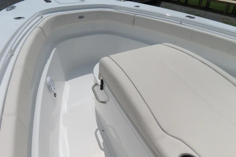 Slide: The Image of 2024 Sea Hunt Gamefish 30 Coffin Box, spacious seating area, white upholstery. - 7