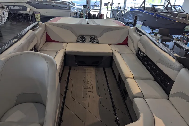 Slide: The Image of Interior of a 2018 Axis T23 boat with spacious seating and modern design. - 26