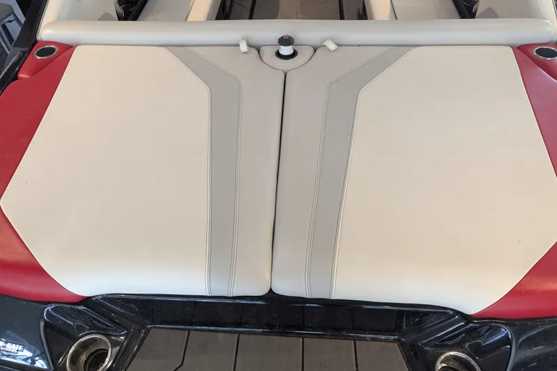 Slide: The Image of 2018 Axis T23 boat interior with beige and red upholstery. - 31