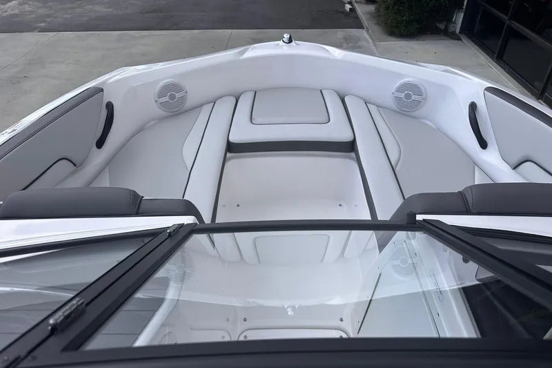 Slide: The Image of 2025 Yamaha Boats AR190 interior with sleek seating and modern design. - 19