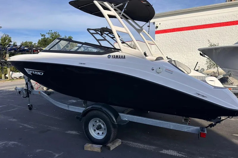 Slide: The Image of 2025 Yamaha Boats AR190 on trailer, sleek design, parked outdoors. - 4