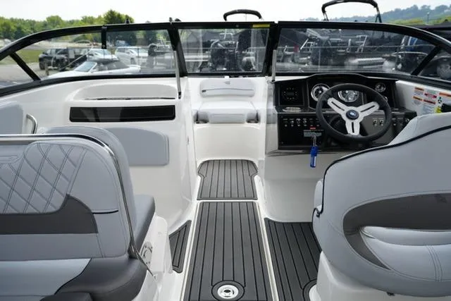 Slide: The Image of 2024 Bayliner VR5 Bowrider I/O interior with modern dashboard and seating. - 12