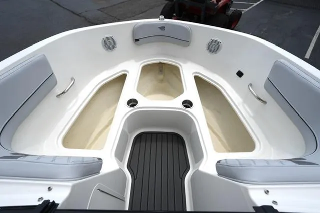 Slide: The Image of 2024 Bayliner VR5 Bowrider I/O boat interior with spacious seating and storage compartments. - 9