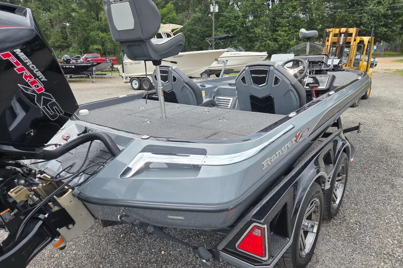 Slide: The Image of 2022 Ranger Z520R boat with Mercury Pro XS engine, parked on a trailer in a lot. - 5