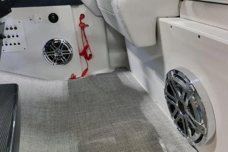 Slide: The Image of Interior of 2024 Formula 310 Sun Sport boat with speakers and control panel. - 12