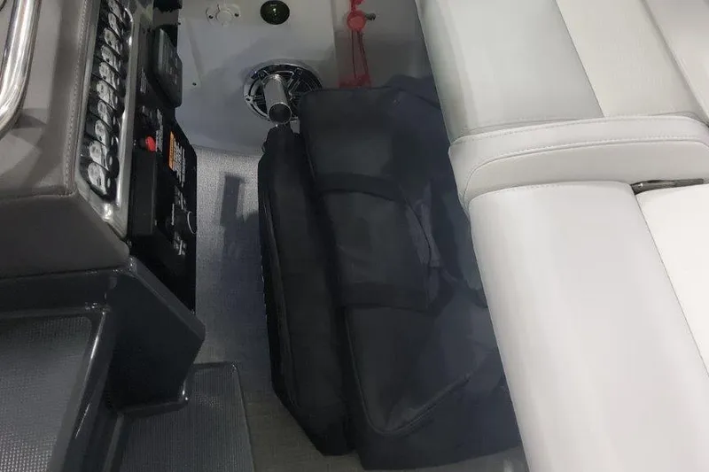 Slide: The Image of Interior of 2024 Formula 310 Sun Sport boat with seating and control panel. - 30