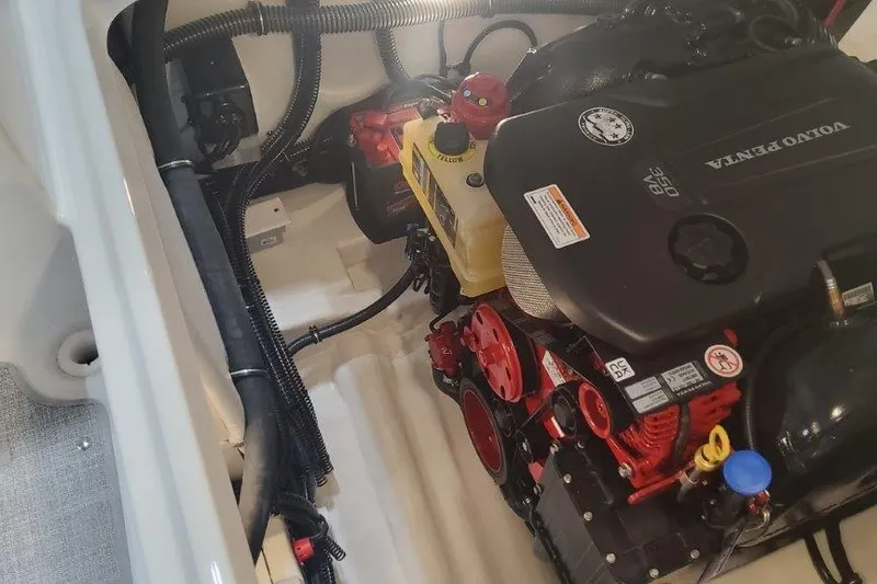 Slide: The Image of Engine compartment of a 2024 Formula 310 Sun Sport boat with Volvo Penta engine. - 32