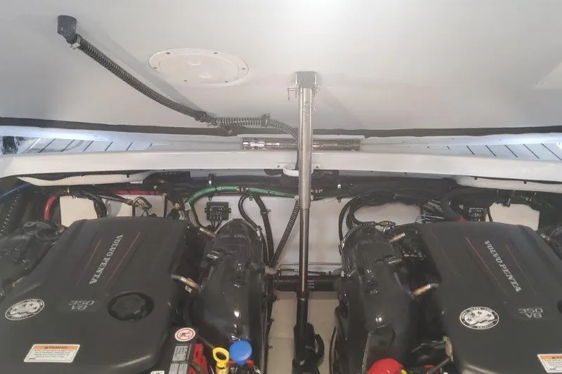 Slide: The Image of Engine compartment of 2024 Formula 310 Sun Sport with dual Volvo Penta engines. - 37