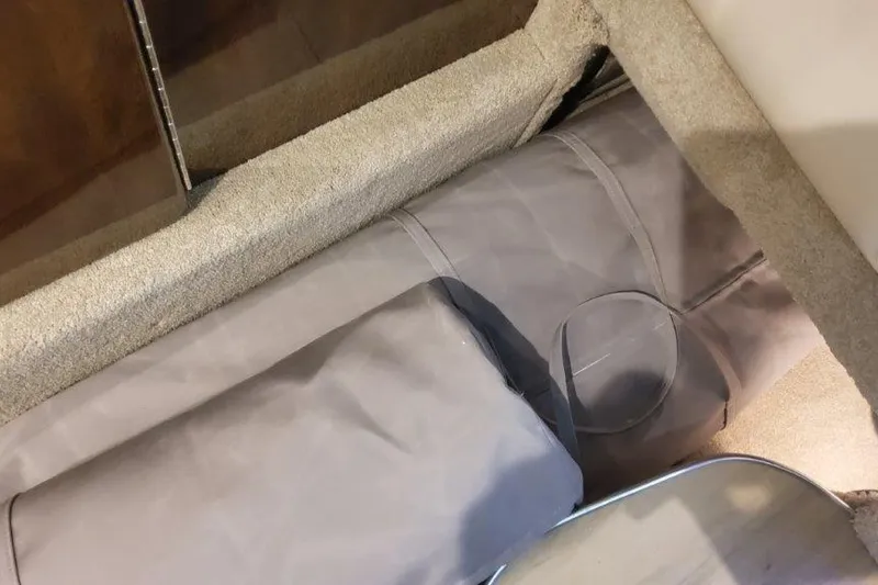 Slide: The Image of Interior view of 2024 Formula 310 Sun Sport boat with carpeted flooring. - 47