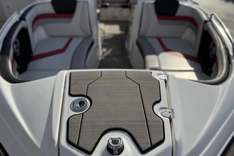 Slide: The Image of 2019 Yamaha Boats 242X E-Series interior with sleek seating and modern design. - 27