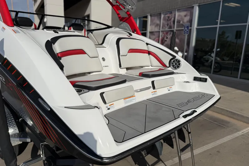 Slide: The Image of 2019 Yamaha Boats 242X E-Series, rear view with seating and swim platform. - 29