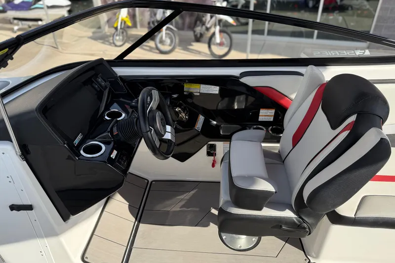 Slide: The Image of 2019 Yamaha Boats 242X E-Series cockpit with sleek design and comfortable seating. - 42