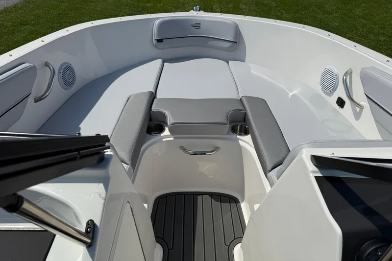 Slide: The Image of 2025 Bayliner VR4 Bowrider I/O interior with cushioned seating and sleek design. - 12