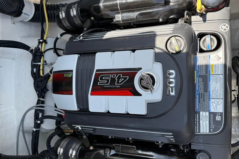 Slide: The Image of 2025 Bayliner VR4 Bowrider I/O engine, featuring a 4.5L 200 horsepower MerCruiser. - 16