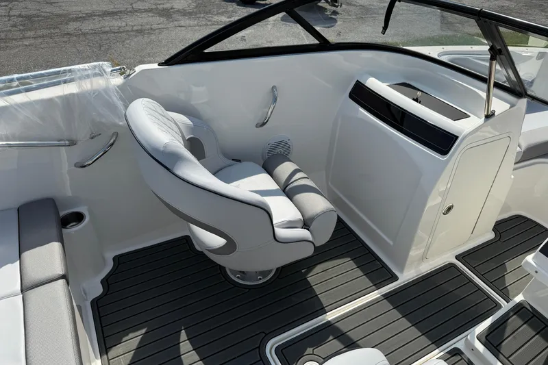 Slide: The Image of 2025 Bayliner VR4 Bowrider I/O interior with sleek seating and modern design. - 7