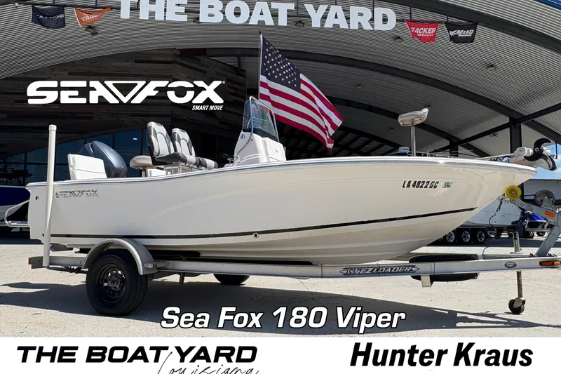 Slide: The Image of 2014 Seafox 180 Viper boat on trailer at The Boat Yard dealership. - 13
