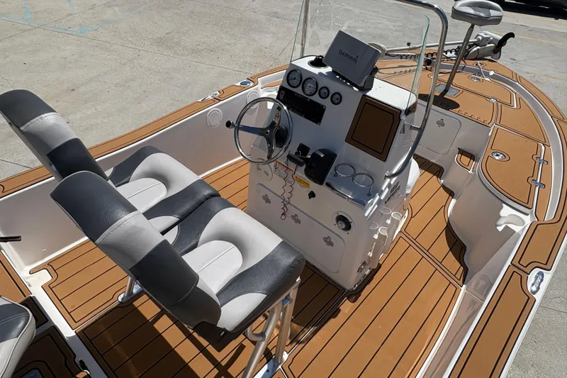 Slide: The Image of 2014 Seafox 180 Viper boat interior with modern console and seating. - 7