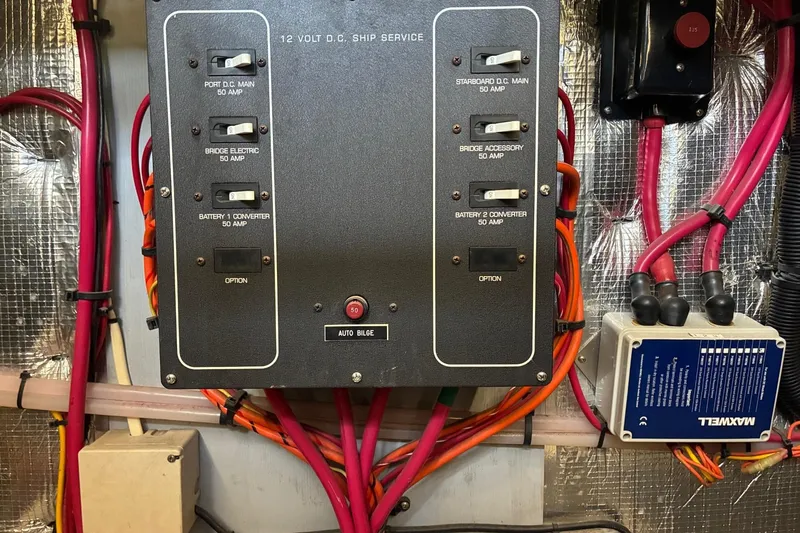 Slide: The Image of Electrical panel on a 2003 Silverton 410 Sport Bridge boat, featuring various circuit breakers. - 29