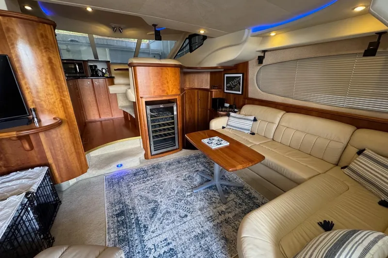 Slide: The Image of Luxurious 2003 Silverton 410 Sport Bridge interior with leather seating and modern amenities. - 6
