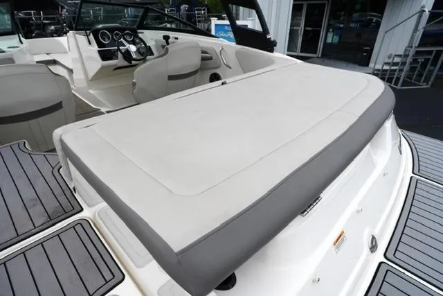 Slide: The Image of 2020 Sea Ray SPX 190 boat interior with sleek seating and modern dashboard design. - 16