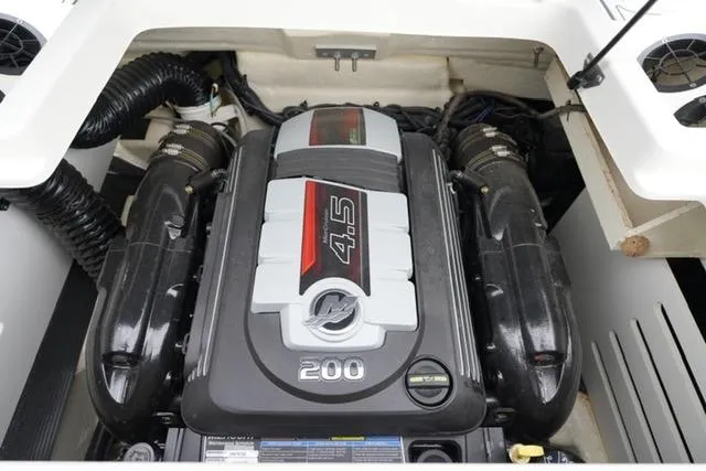 Slide: The Image of 2020 Sea Ray SPX 190 engine compartment featuring a 4.5L 200 horsepower engine. - 17
