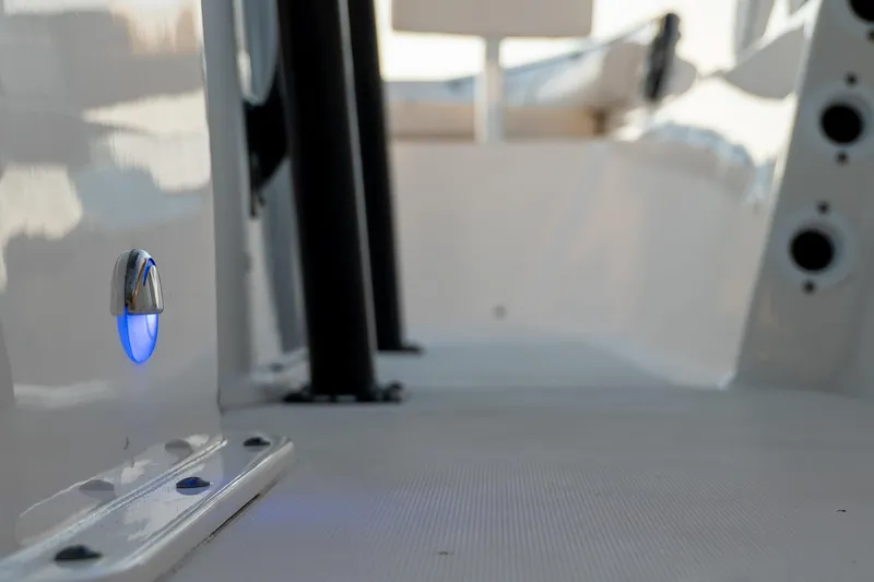 Slide: The Image of 2021 Sea Born LX24 Center Console interior with blue LED light detail. - 20