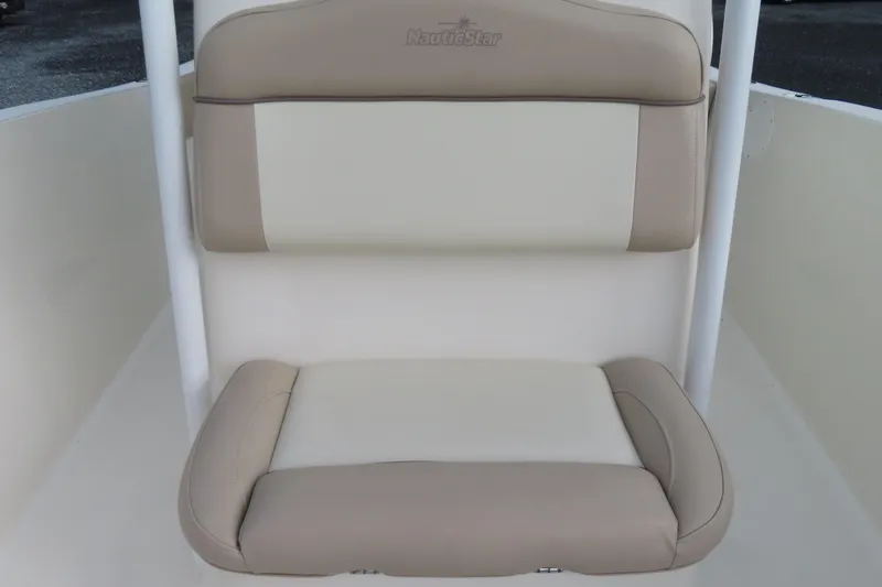 Slide: The Image of 2017 NauticStar 25 XS Offshore boat seat, beige and cream upholstery. - 18