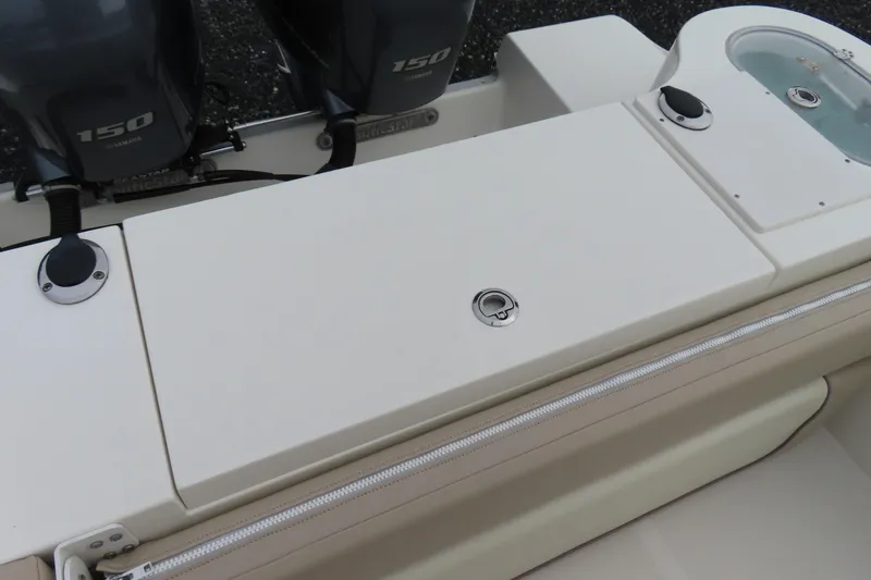 Slide: The Image of 2017 NauticStar 25 XS Offshore boat with dual Yamaha 150 engines, rear deck view. - 36