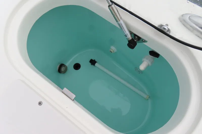 Slide: The Image of Livewell in 2017 NauticStar 25 XS Offshore boat, filled with water. - 39