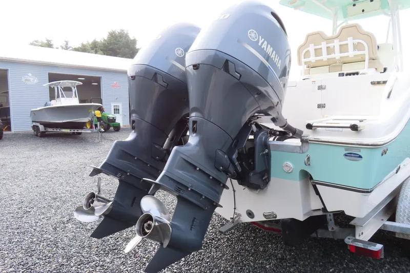 Slide: The Image of 2017 NauticStar 25 XS Offshore boat with dual Yamaha outboard engines. - 4