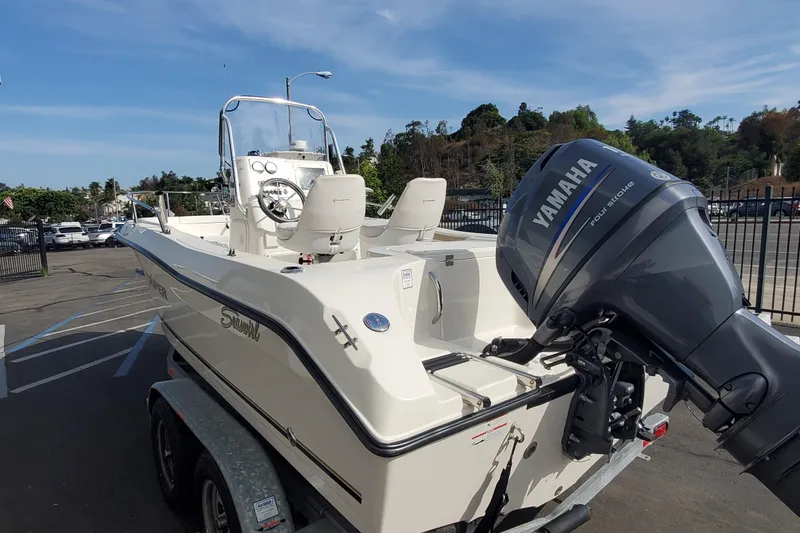 Slide: The Image of 2005 Seaswirl Striper 1851 Center Console boat with Yamaha outboard motor on trailer. - 3