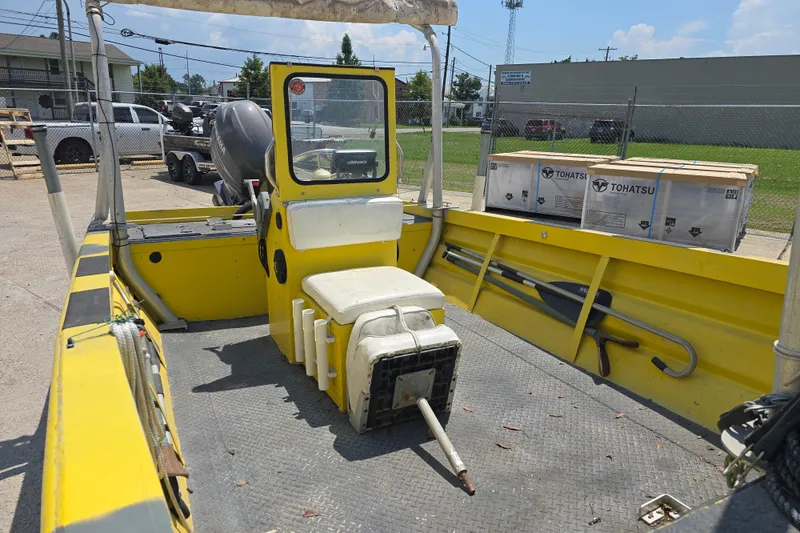 Slide: The Image of Yellow Rookie 22 boat interior with seating and equipment, 2006 model. - 10