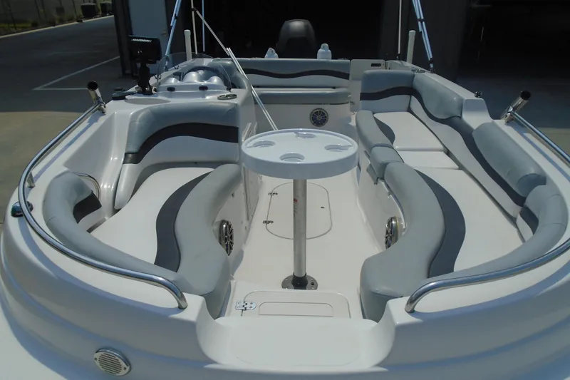 Slide: The Image of 2013 Starcraft Limited 1915 OB boat interior with seating and table. - 16