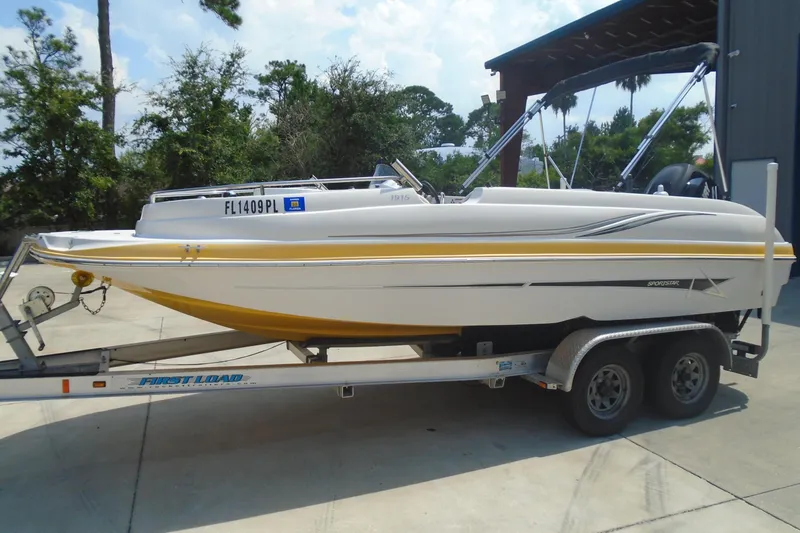 The Image of 2013 Starcraft Limited 1915 OB boat on trailer, parked outdoors. - 9