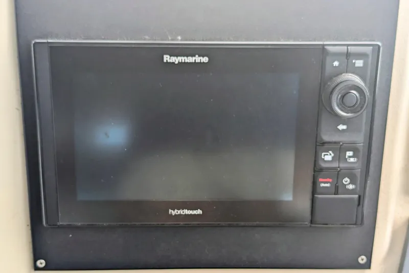 Slide: The Image of Raymarine Hybridtouch display on 2000 Cruisers Yachts 3870 Express dashboard. - 15
