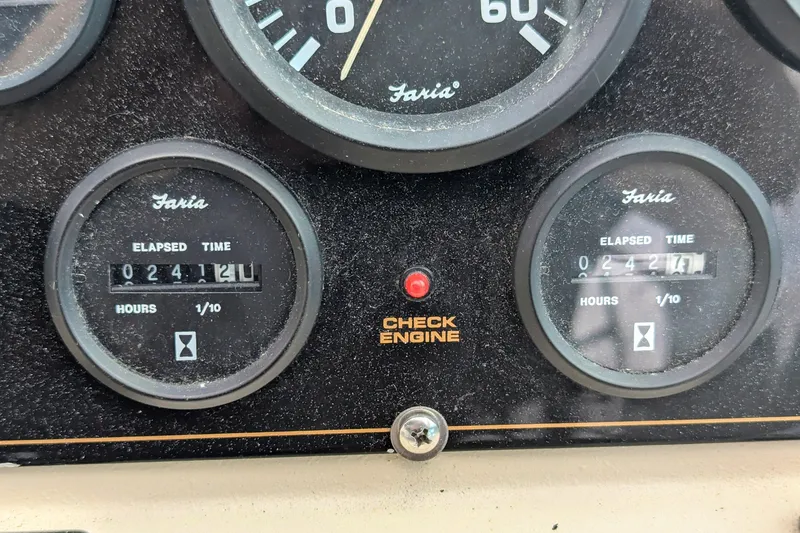 Slide: The Image of Close-up of 2000 Cruisers Yachts 3870 Express dashboard with elapsed time gauges. - 14