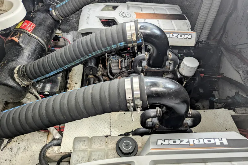 Slide: The Image of Engine compartment of a 2000 Cruisers Yachts 3870 Express with Horizon components. - 36