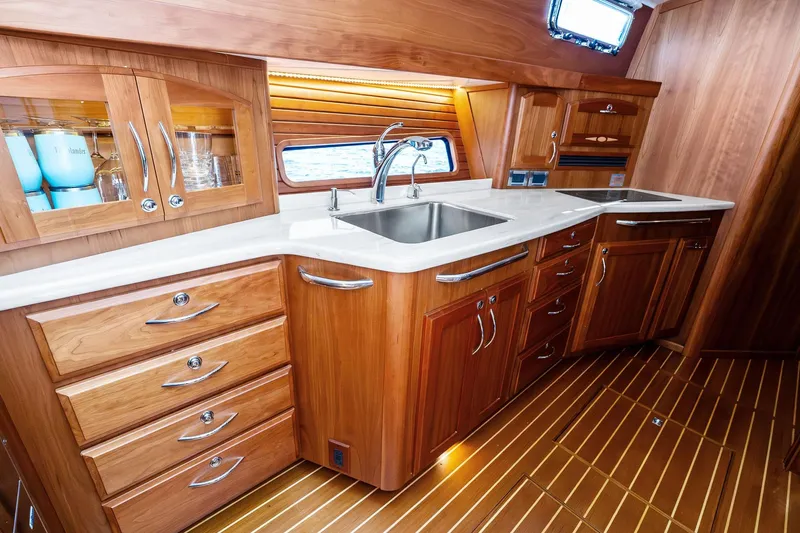 Slide: The Image of Luxurious wooden kitchen interior of 2019 Sabre Flybridge yacht with modern amenities. - 34