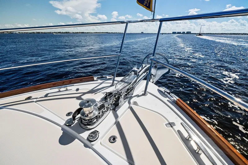 Slide: The Image of 2019 Sabre Flybridge yacht deck with ocean view and clear blue sky. - 53