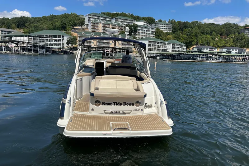 Slide: The Image of 2018 Formula 370 Super Sport boat on a lake with scenic background. - 11