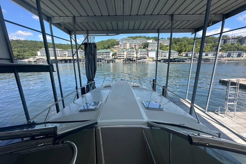 Slide: The Image of Control panel of a 2018 Formula 370 Super Sport boat with switches and radio. - 12