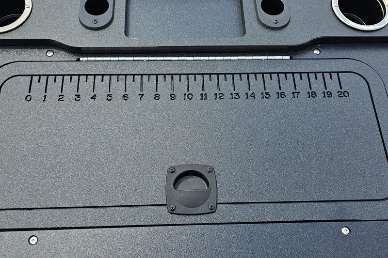 Slide: The Image of 2026 Sun Tracker Sportfish 24 XP3 boat deck with integrated measuring ruler. - 21