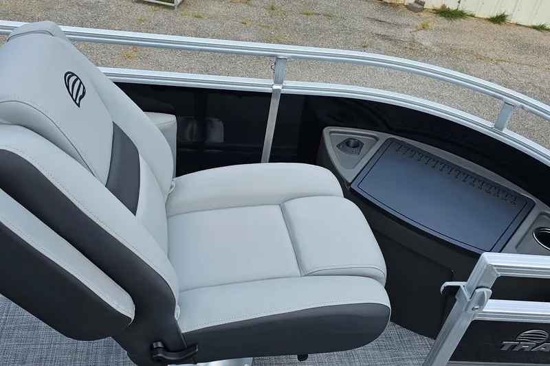Slide: The Image of 2026 Sun Tracker Sportfish 24 XP3 boat seat and console, featuring sleek design and comfort. - 7